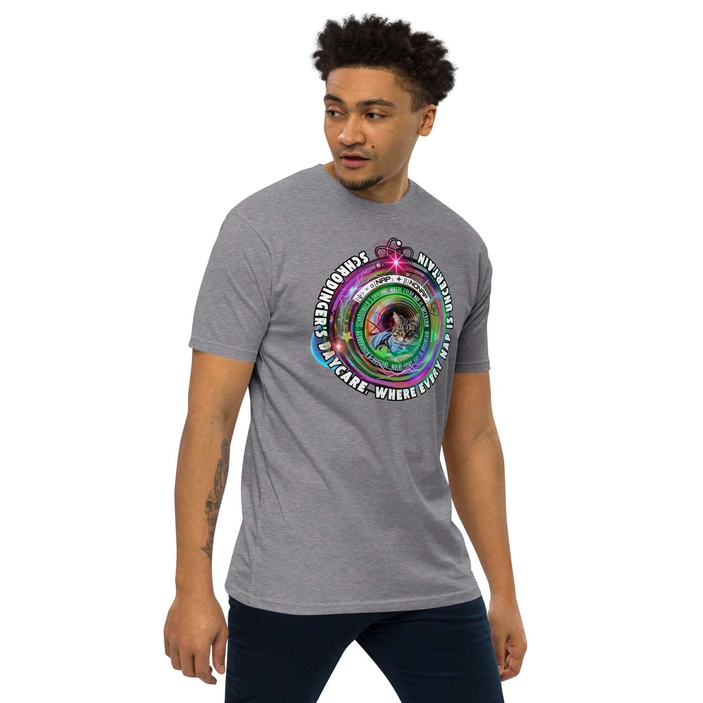 Gray Schrödinger's Daycare tee featuring cosmic cat design blending quantum physics with feline themes, worn by a male model.