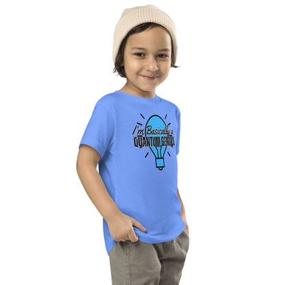 Toddler wearing blue Technium Foundry tee with "I'm Basically a Quantum Genius" print, stylish and comfy for everyday adventures.