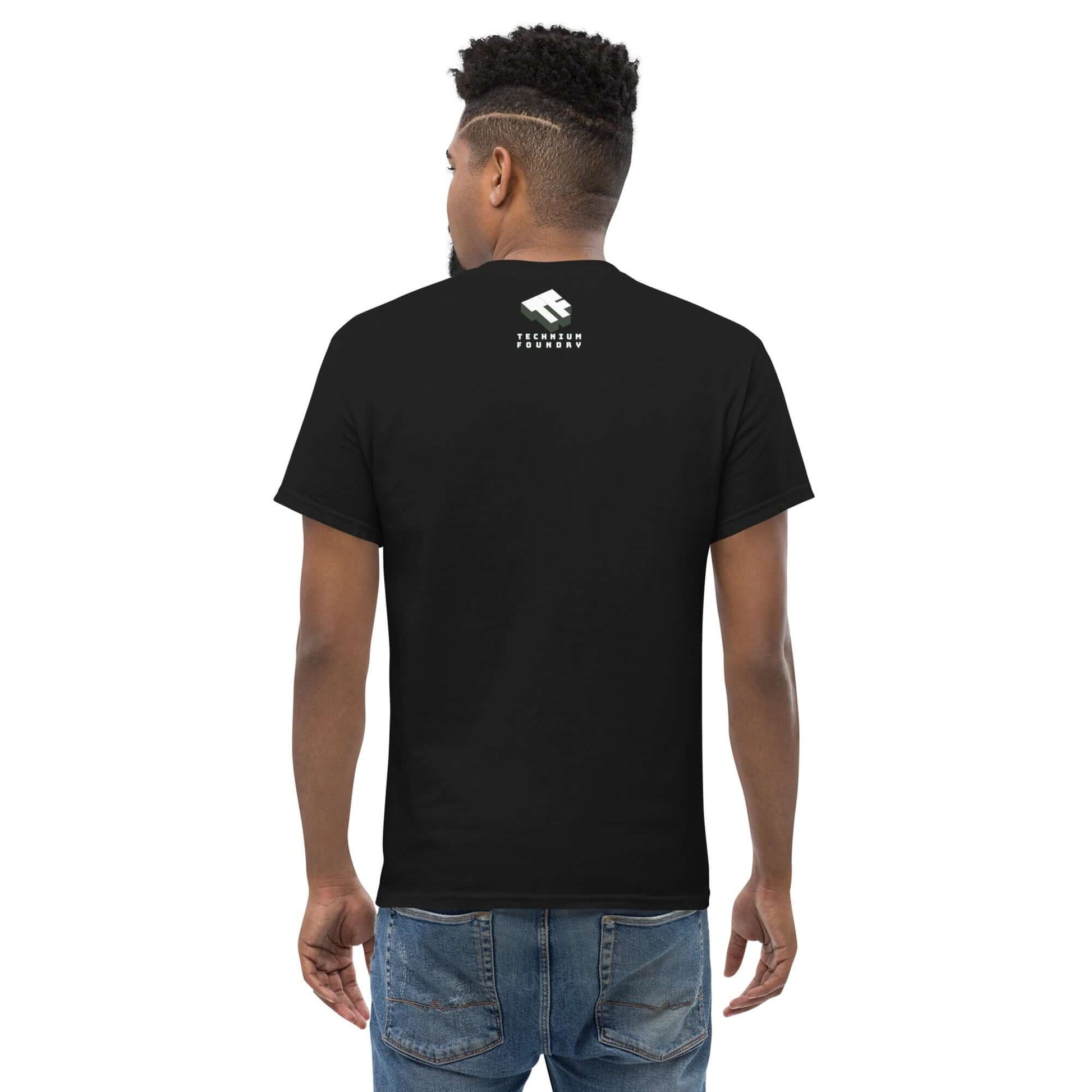 Man wearing black Quantum Physics T-Shirt with Randomness Calibrated atom design on the back.