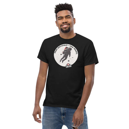 Man wearing black T-shirt with astronaut and code design, text "First Astronaut = New Branch();", by Technium Foundry.