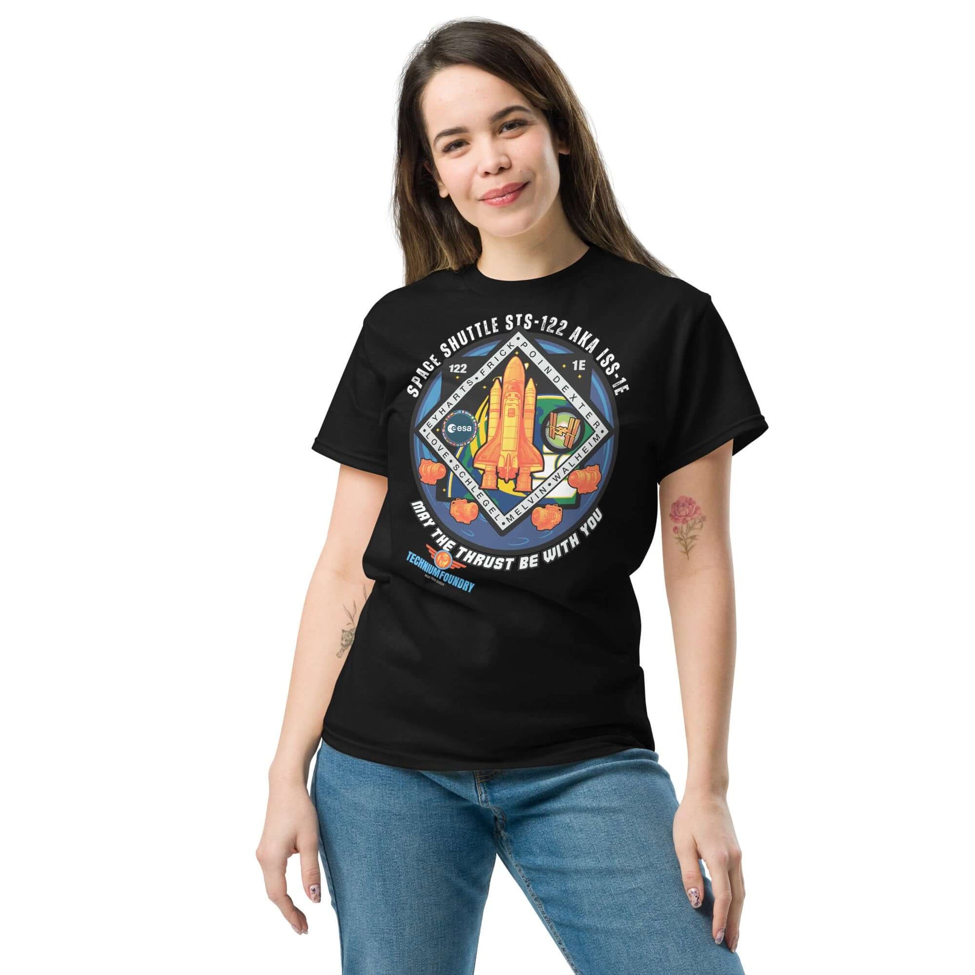 Woman wearing "May The Thrust Be With You" Space Shuttle Tee from Technium Foundry's Science & Tech Apparel Collection.