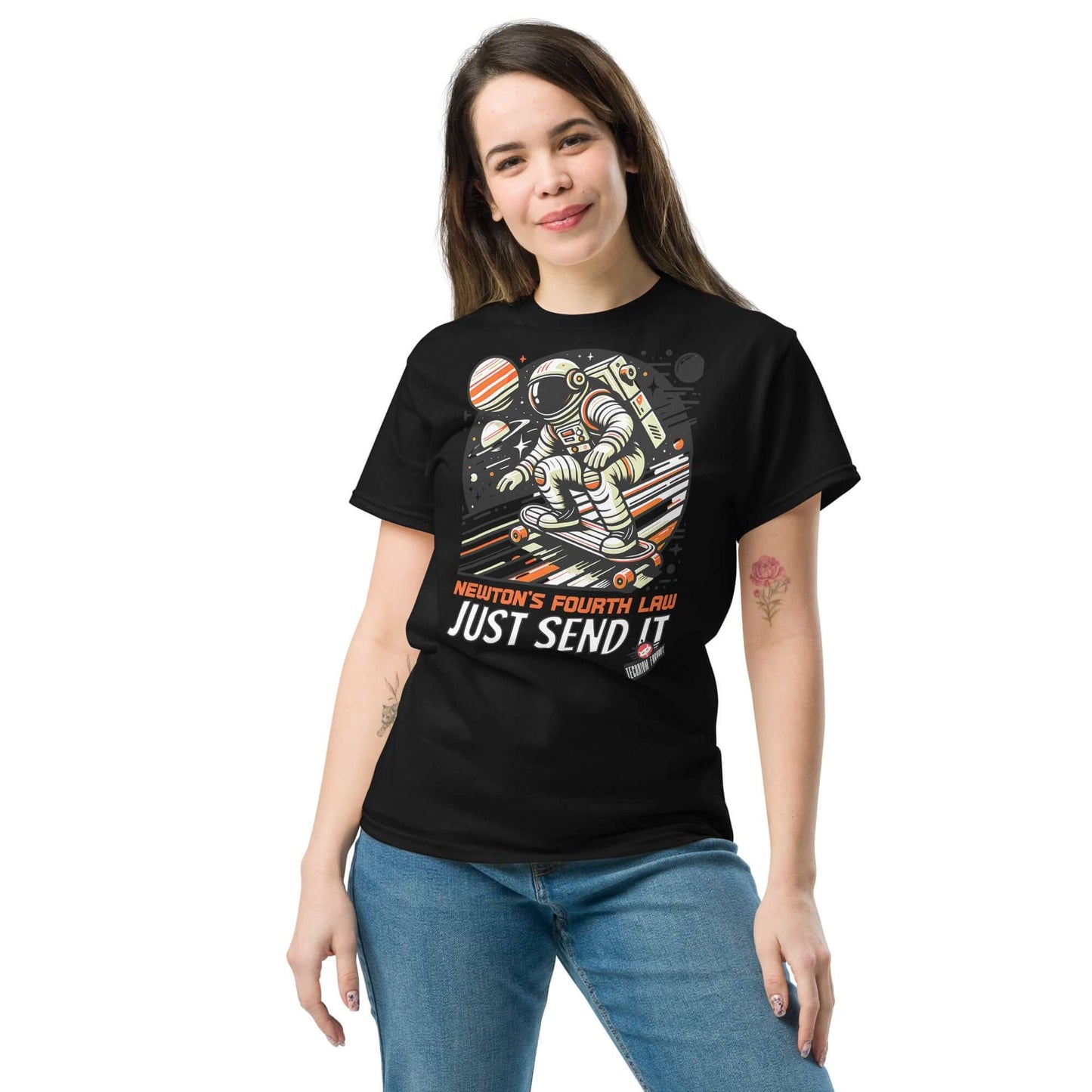 Woman wearing Newton's Fourth Law T-shirt by Technium Foundry, featuring cosmic skater design with "Just Send It" slogan.