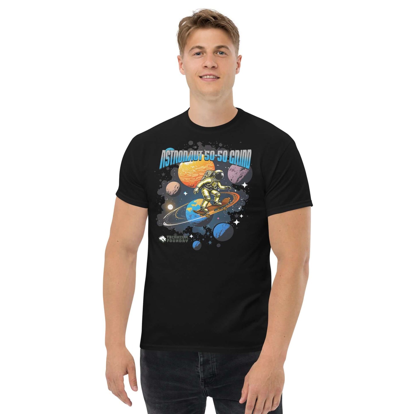 Man wearing Astronaut 50-50 Grind T-Shirt, featuring space skater design with planets and text by Technium Foundry.