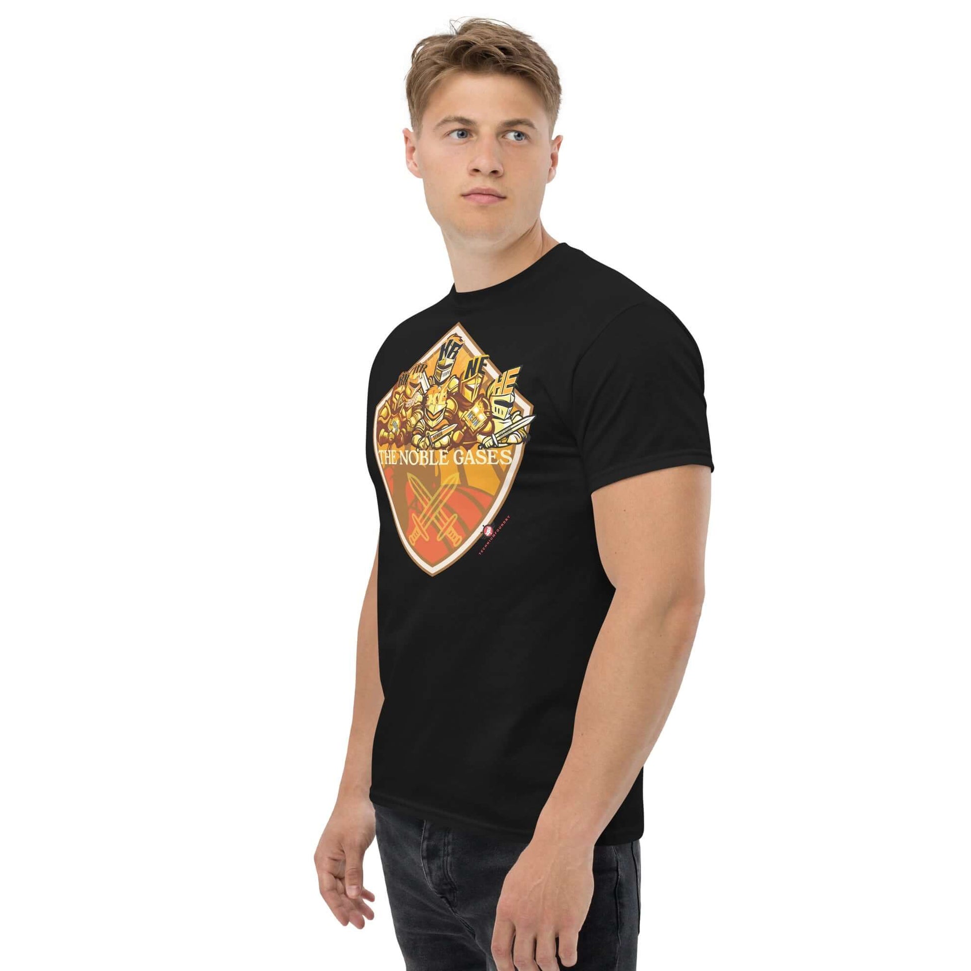 Man wearing The Noble Gases T-Shirt by Technium Foundry featuring a medieval coat of arms with noble elements design.