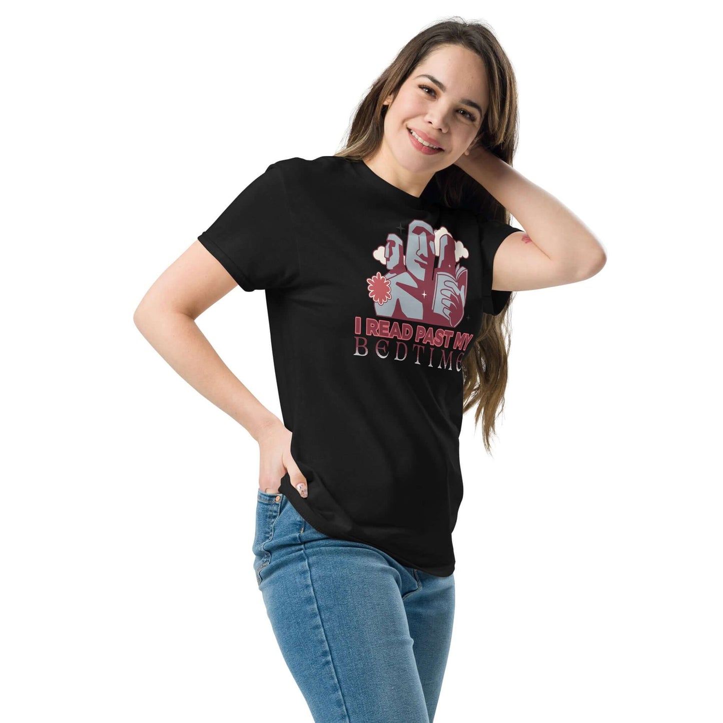 Woman wearing a black "I Read Past My Bedtime" T-shirt featuring Easter Island moai design in dusky rose and gray colors.