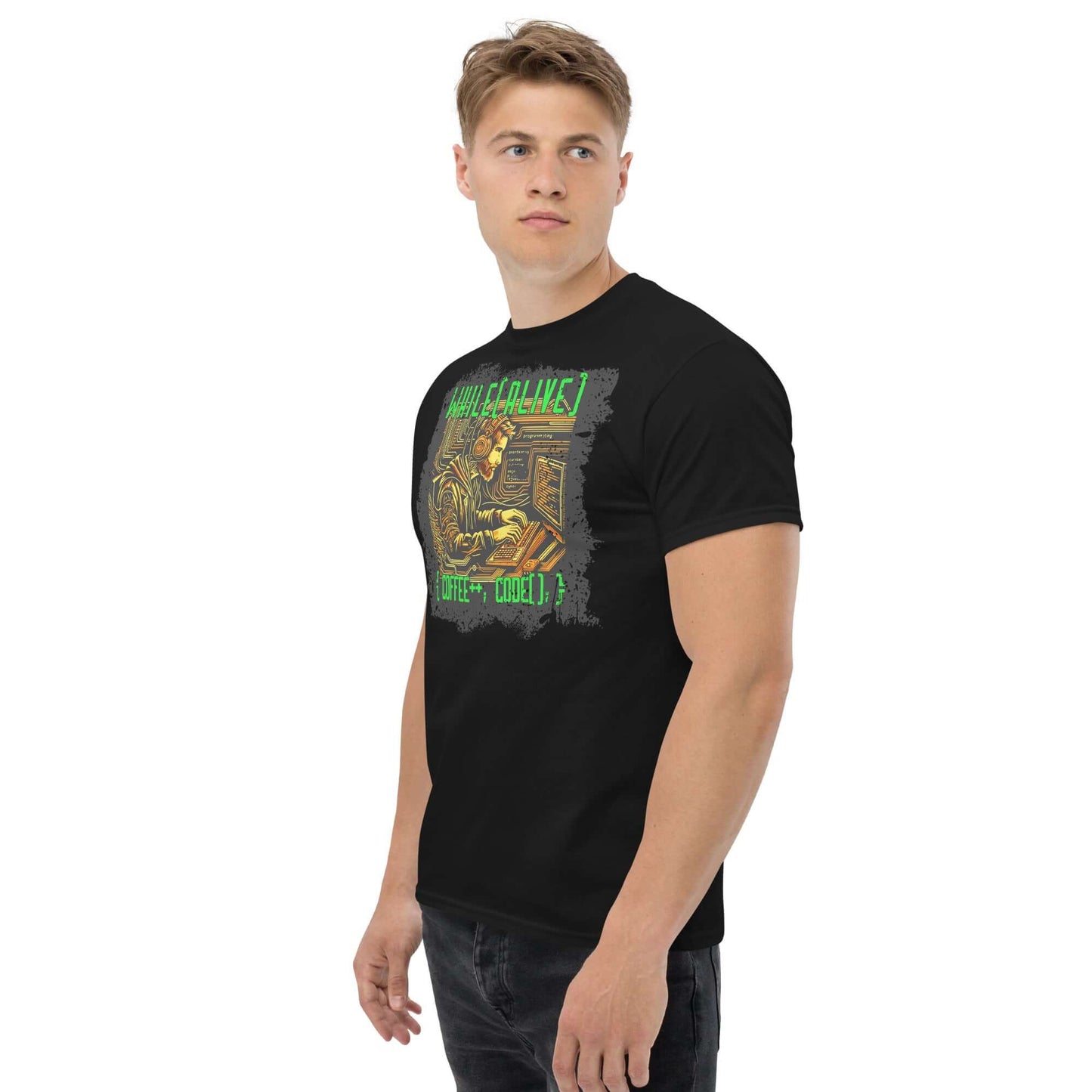 Person wearing a black While(alive) Programmer T-Shirt with code and coffee humor design, featuring green and gold matrix-style graphics.