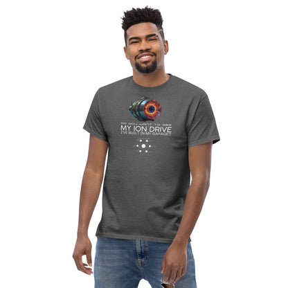 Man wearing "The Garage-Built Ion Drive" tee from the Science & Tech Apparel Collection by Technium Foundry.