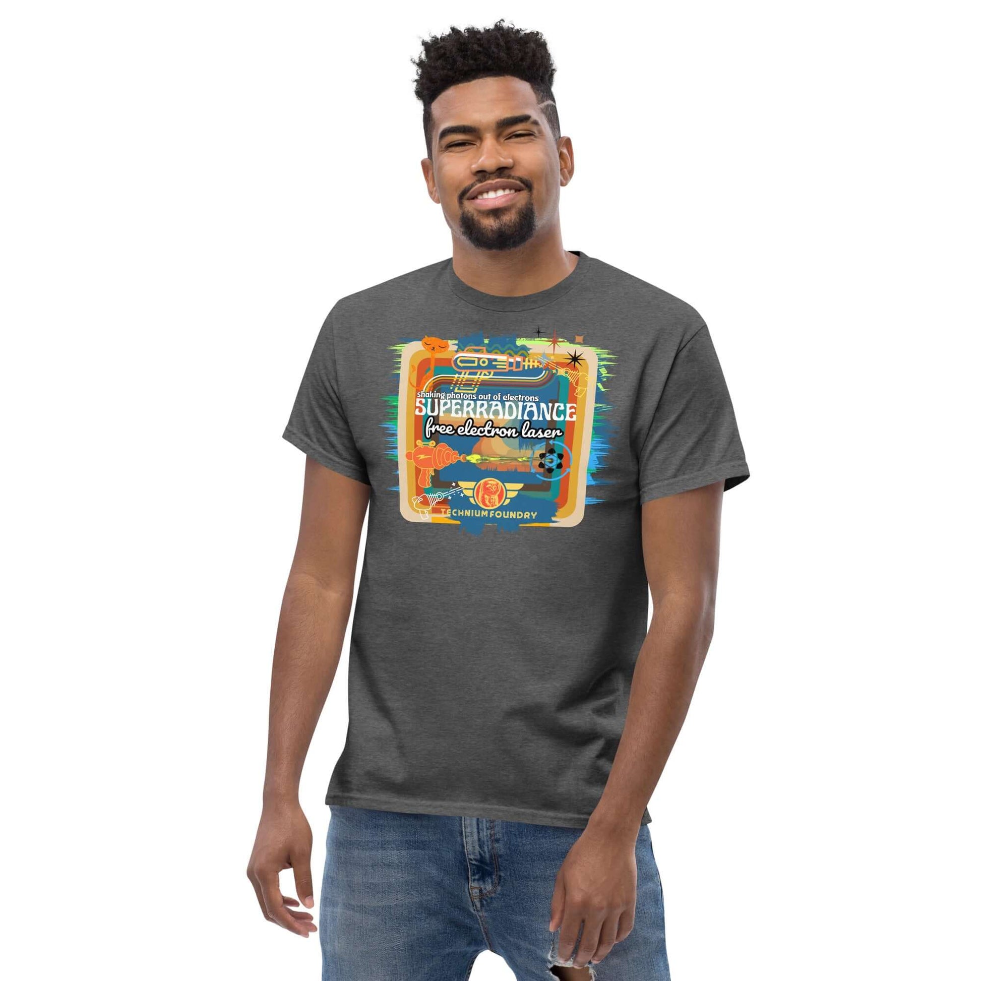 Man wearing a Superradiance Free Electron Laser T-shirt with retro science design in vibrant colors.