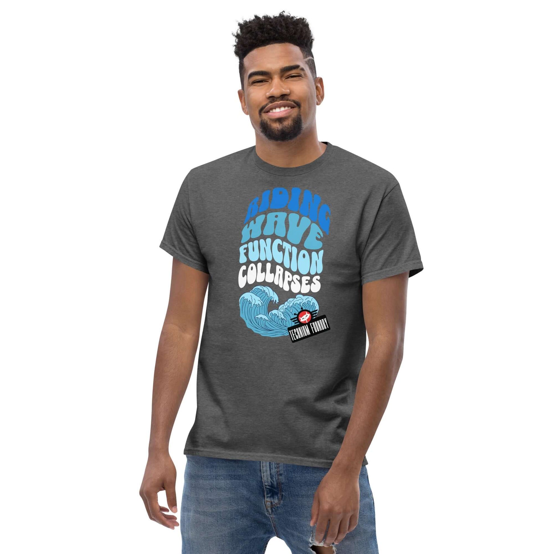 Man wearing Riding Wave Function Collapses T-Shirt featuring quantum surfing design by Technium Foundry, science geek apparel.