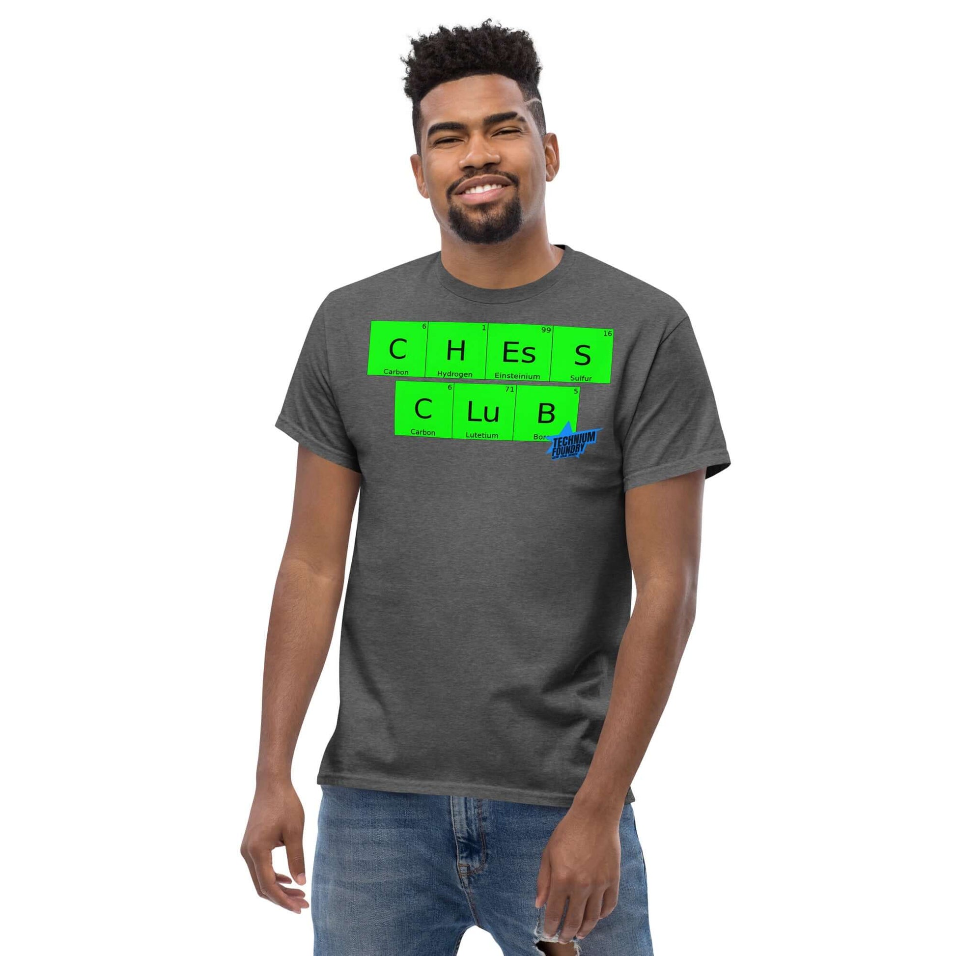 Chess Club T-Shirt by Technium Foundry, featuring a green element-inspired design on premium cotton, worn by a model.