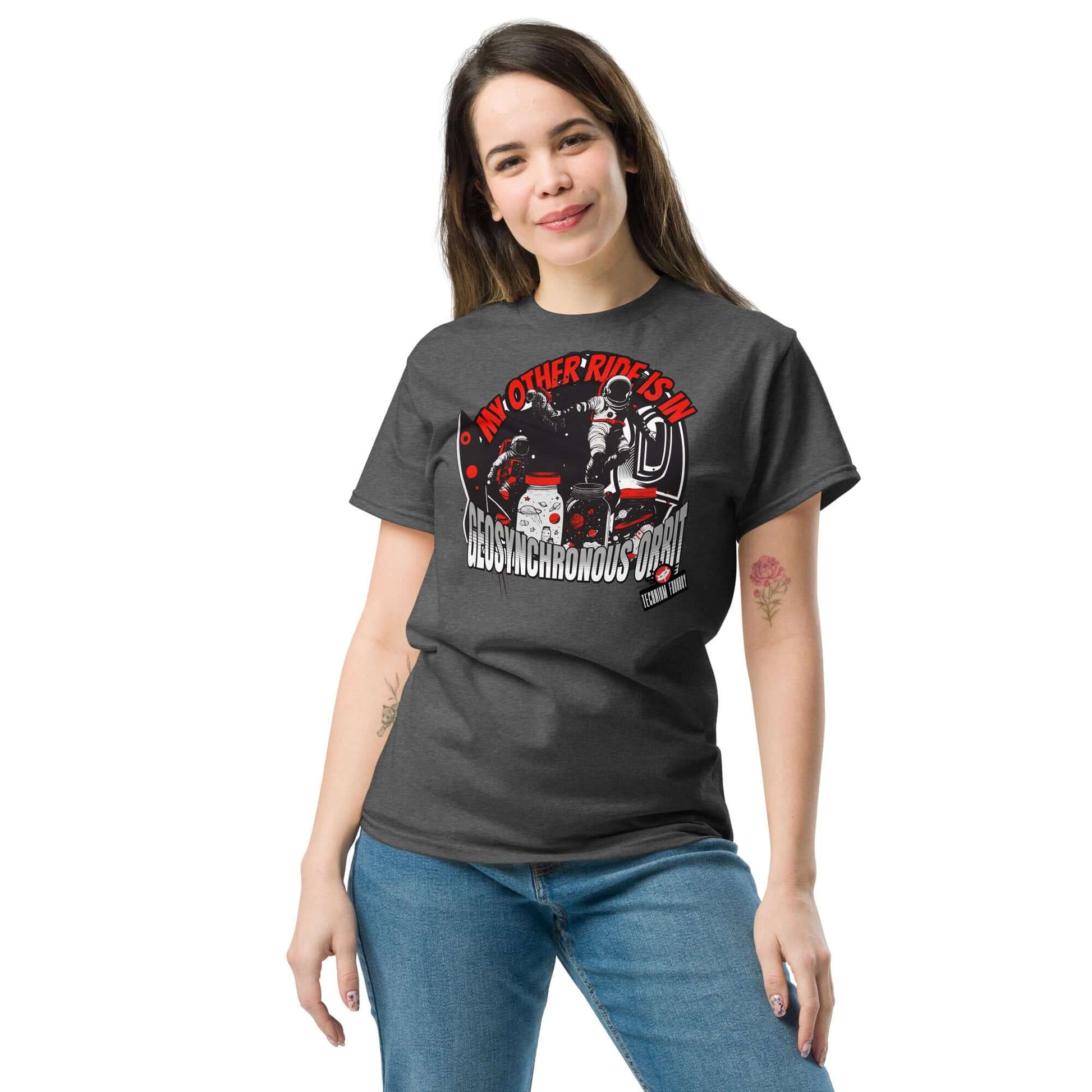 Woman wearing "My Other Ride is in Geosynchronous Orbit" T-shirt by Technium Foundry, featuring astronaut graphics and space theme.