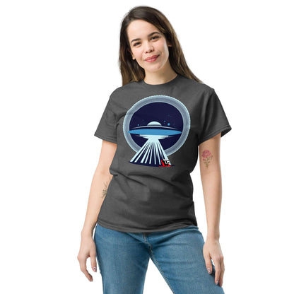 Woman wearing UFO Christmas T-Shirt by Technium Foundry, featuring minimalist UFO design with a sleigh in a beam, holiday humor.