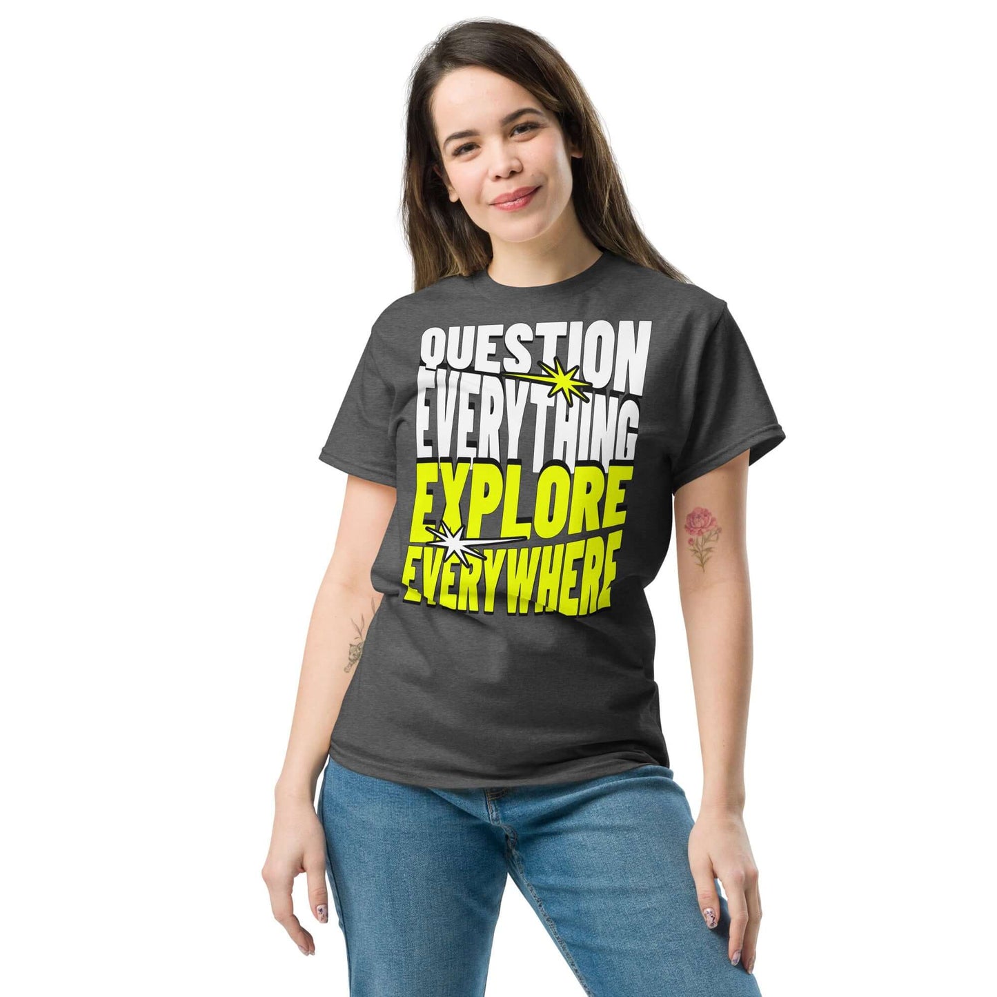 Woman wearing a "Question Everything Explore Everywhere" adventure T-shirt in minimalist style with bold white and yellow text.