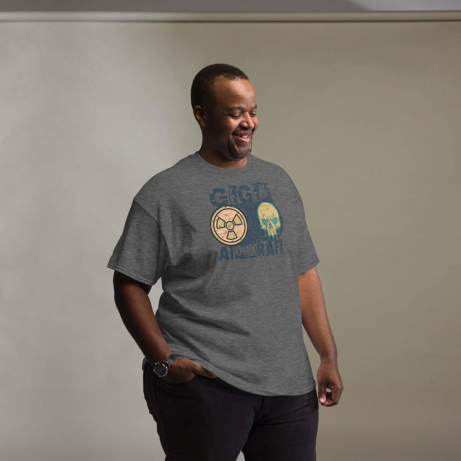 Man wearing GEGEN ATOMKRAFT protest t-shirt with radiation symbol and skull design, anti-nuclear power fashion statement