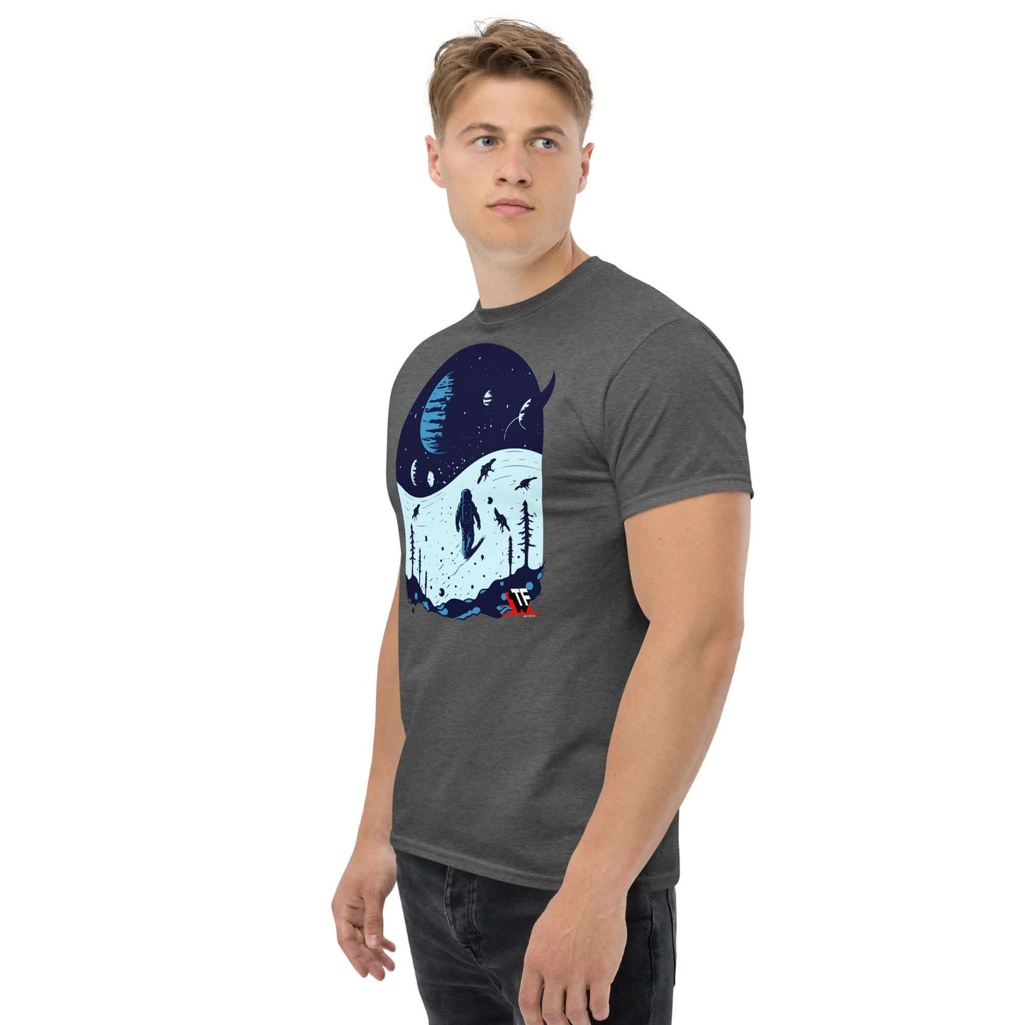 Space Dinosaur Slopes T-Shirt by Technium Foundry with astronaut and T-Rex design on dark fabric, worn by a model.