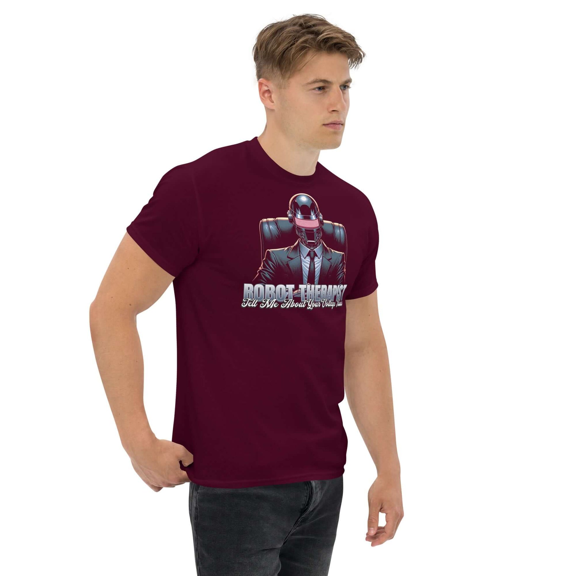 Maroon t-shirt featuring Robot Therapist graphic with "Tell Me About Your Voltage Issues" text, worn by a model.