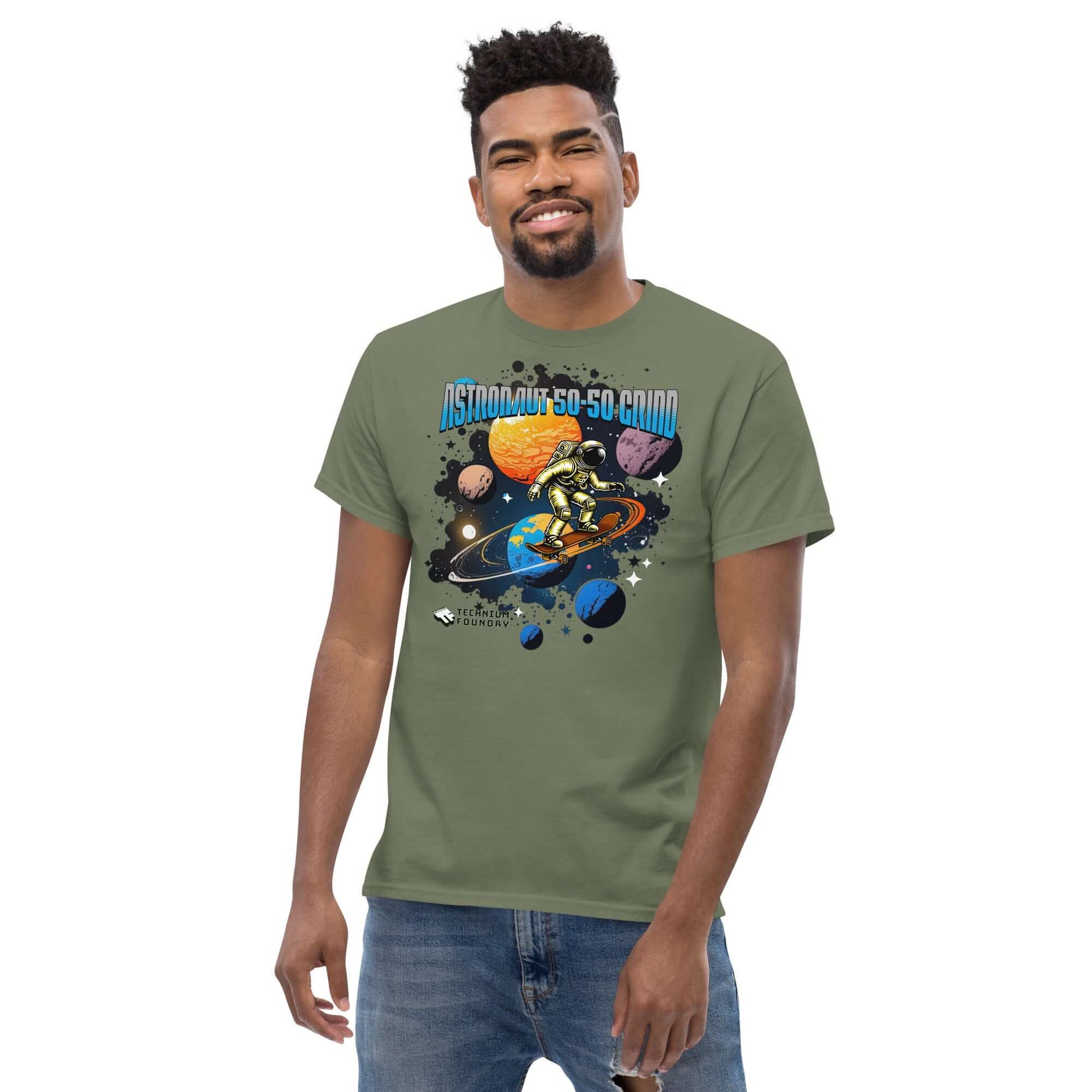 Man wearing Astronaut 50-50 Grind T-Shirt by Technium Foundry, featuring space skater design with Saturn's rings and planets.