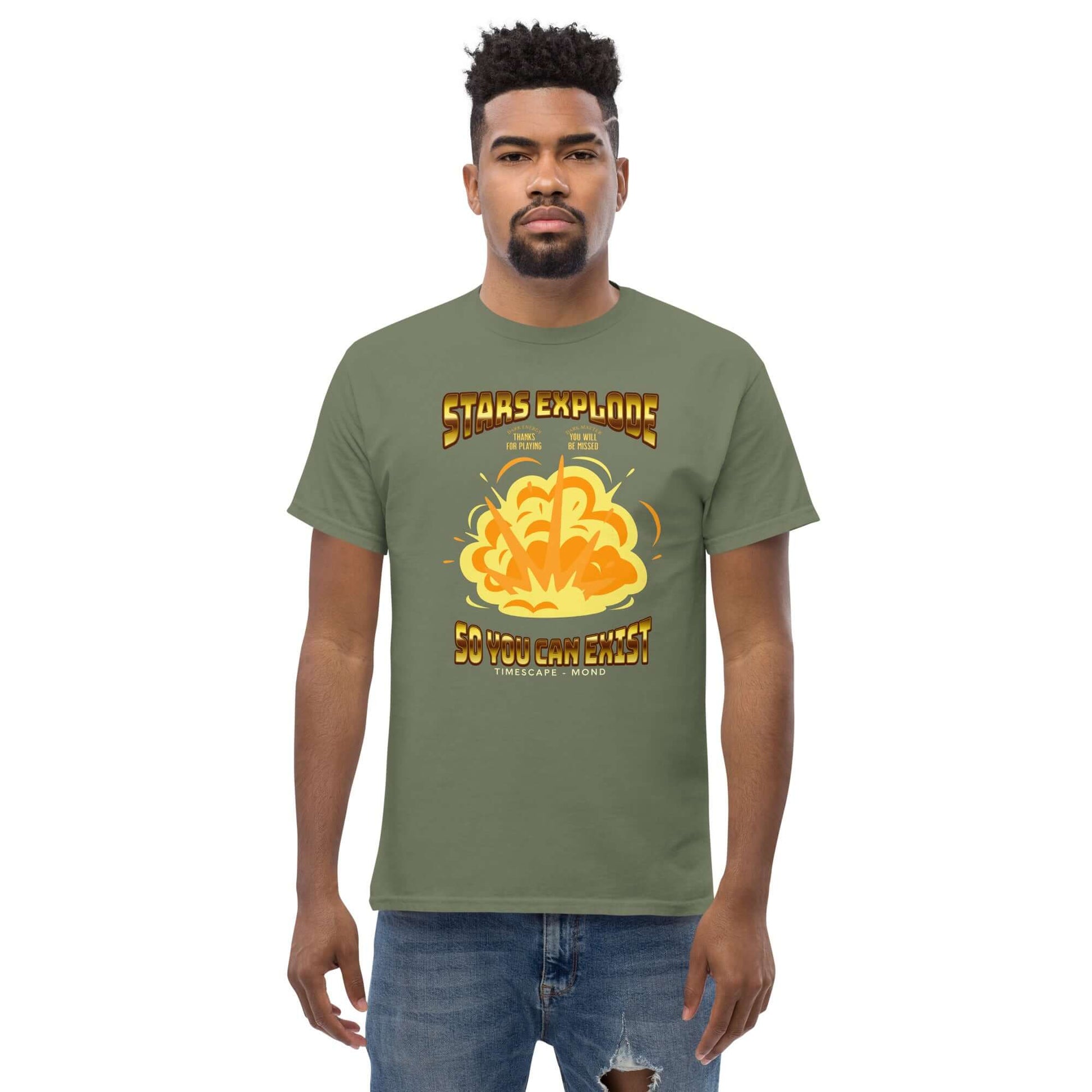 Man wearing "Stars Explode So You Can Exist" T-shirt by Technium Foundry, olive green with vibrant supernova design.