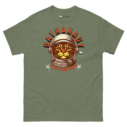 "Catronaut Feline Space Medal T-Shirt by Technium Foundry featuring a cat in a space helmet on a green shirt"