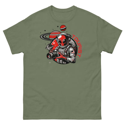 Retro space tourist T-shirt featuring an alien with a camera at Saturn's rings, perfect for sci-fi and travel enthusiasts.