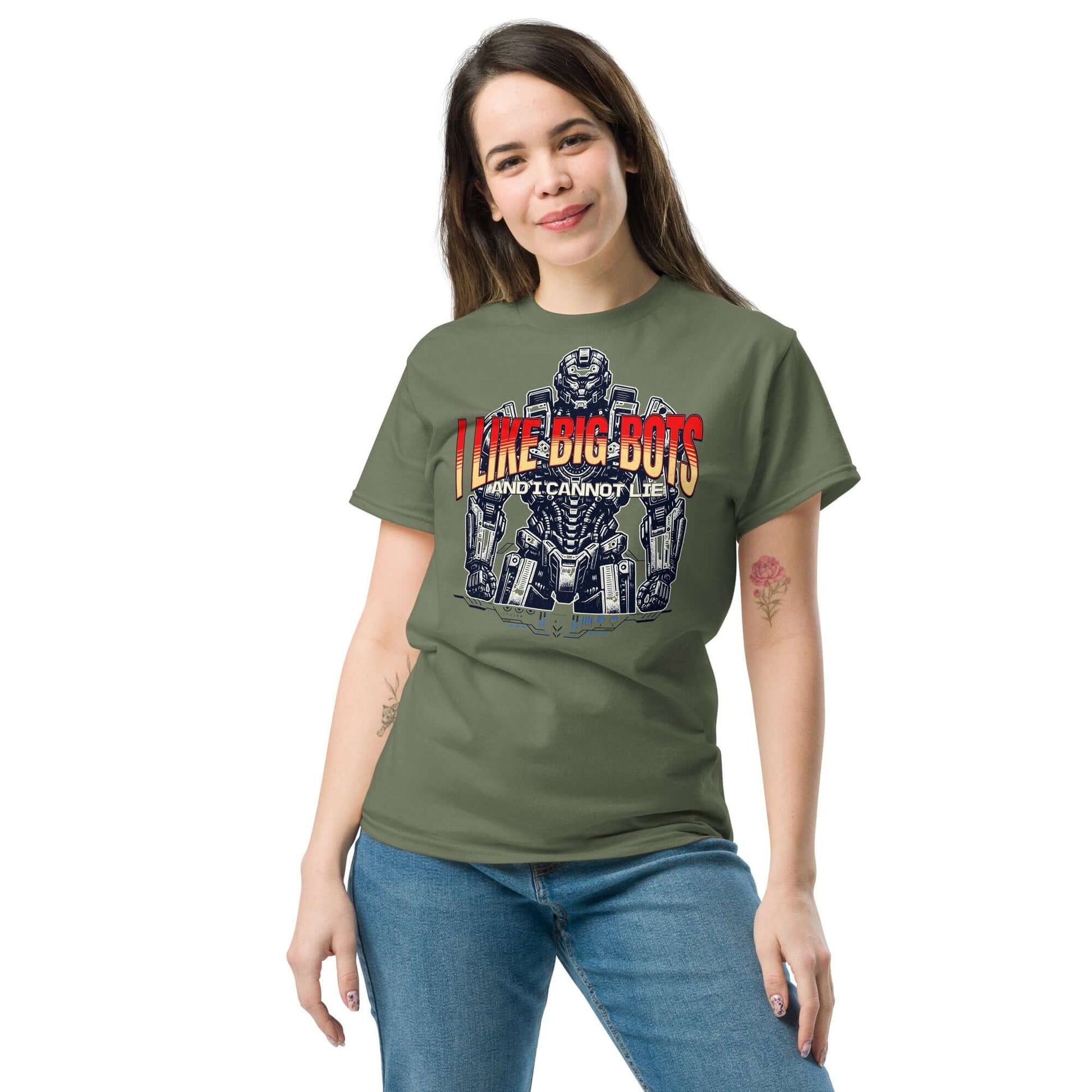 "I Like Big Bots" T-shirt featuring mech design worn by a smiling individual, ideal for robot enthusiasts. Green shirt, casual fit.