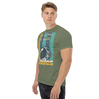 Model wearing green "Physics Force Joules T-Shirt" with astronaut helmet design and pun text "May the Work-Energy Be With You".