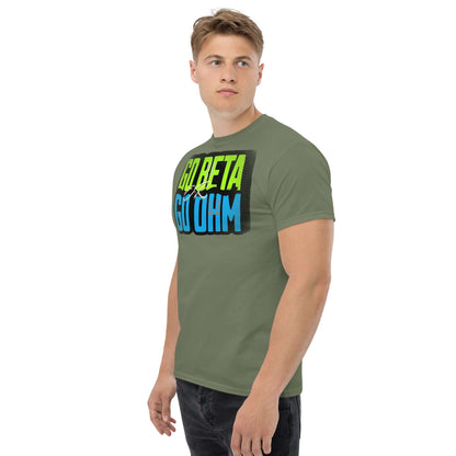 Person wearing Go Beta Go Ohm T-Shirt, featuring playful physics design with radioactive and electrical themes in green and blue.