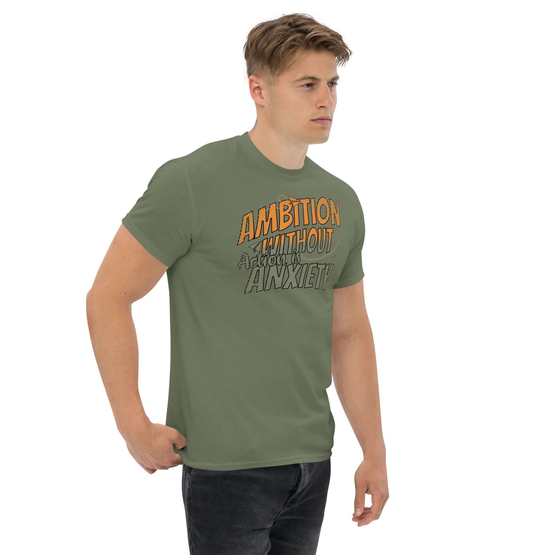 Man wearing 'Ambition Without Anxiety' t-shirt with aspirational mental health humor design.