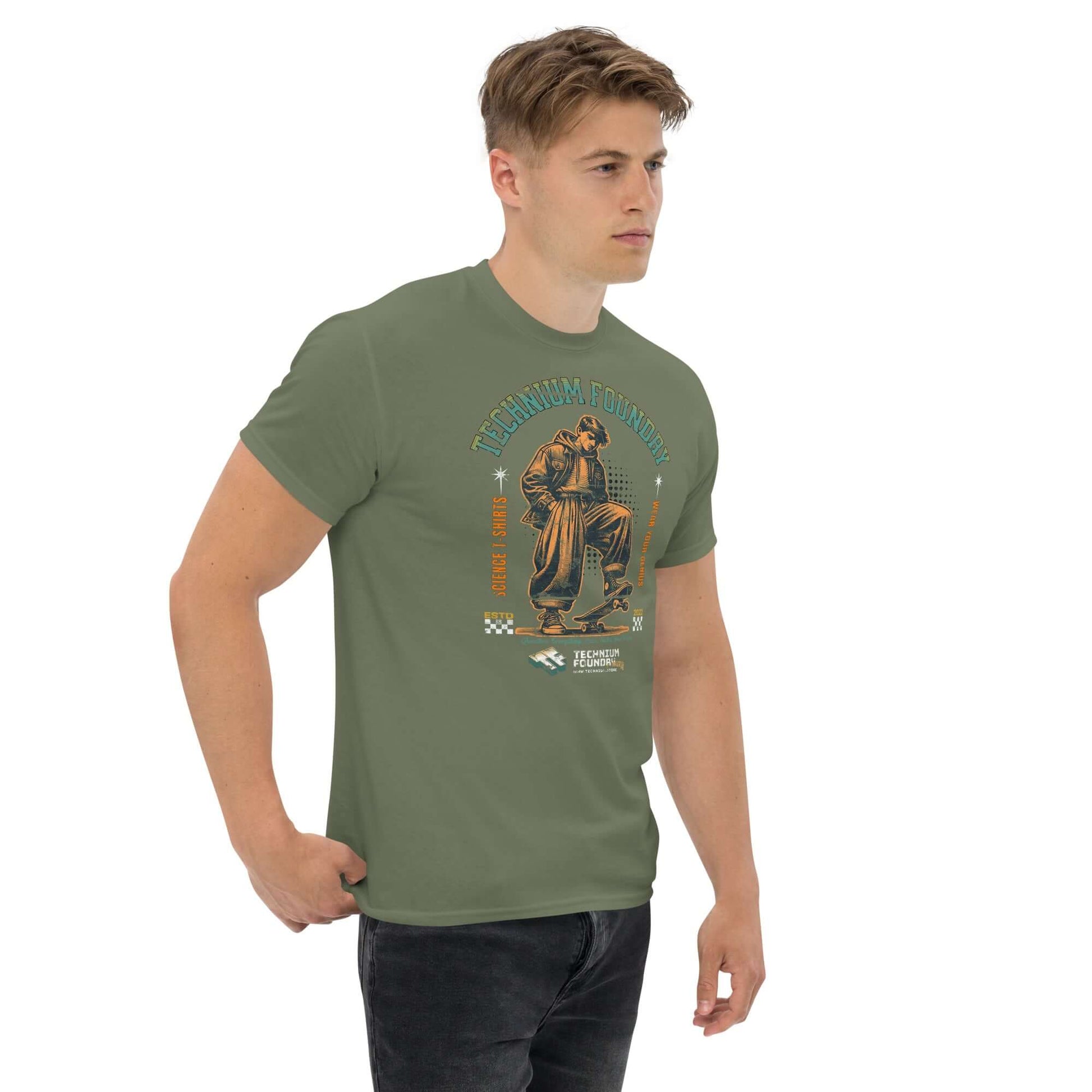 Man wearing Technium Foundry Skater Scientist T-Shirt with vintage physics design on green background.