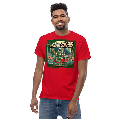 Man wearing red Cafe Racer Space T-Shirt featuring vintage motorcycle astronaut design with desert and celestial background.