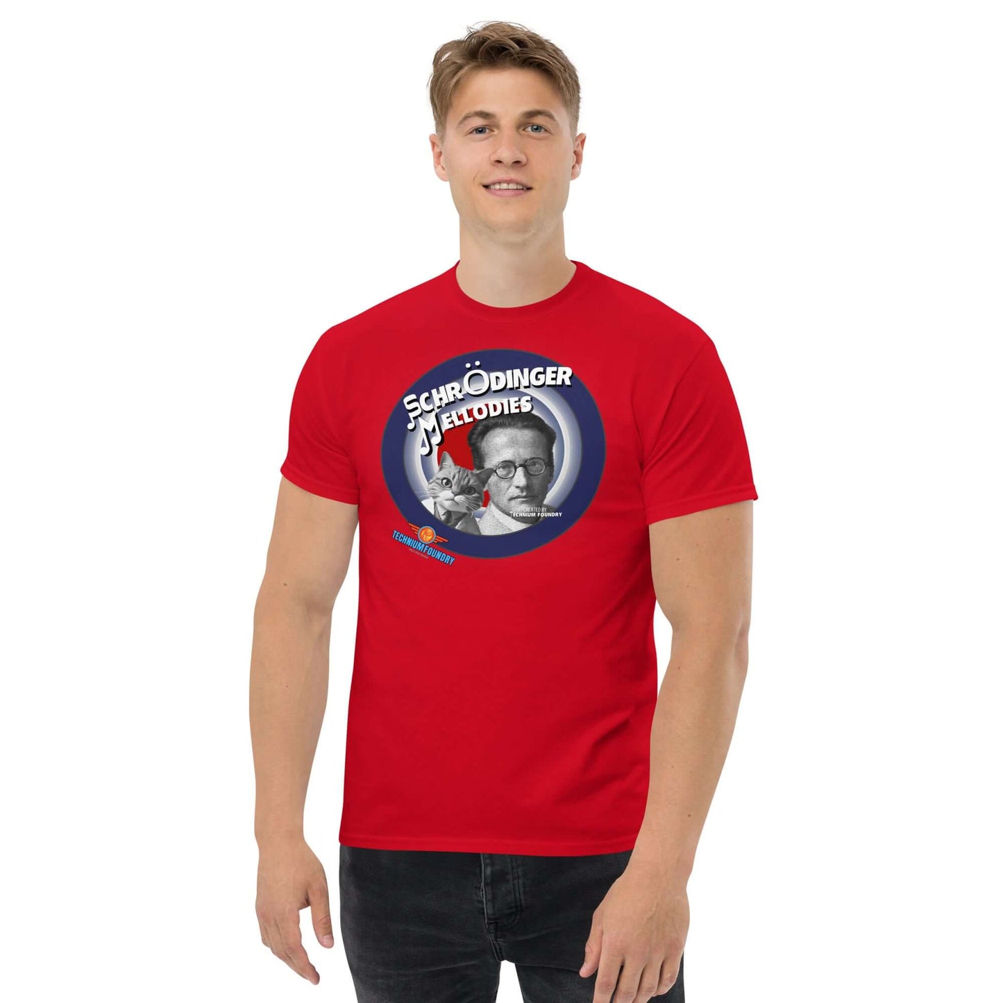 Man wearing a red "Schrödinger's Melodies" T-shirt with quantum and music theme featuring Erwin Schrödinger graphic design.