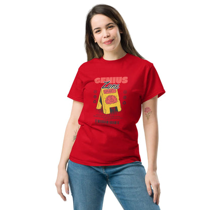 Woman wearing red Genius Zone Caution T-Shirt by Technium Foundry featuring retro-tech design and cheeky brain warning label.