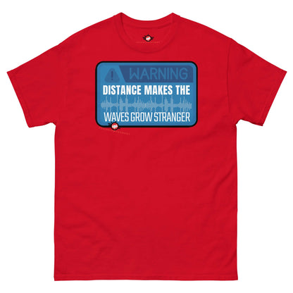 Red t-shirt with "Warning: Distance Makes Waves Grow Stranger" design, ideal for quantum apparel and science geek shirts.