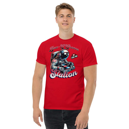 Man wearing a red Zero-G Groove Station T-shirt with astronaut DJ design by Technium Foundry.