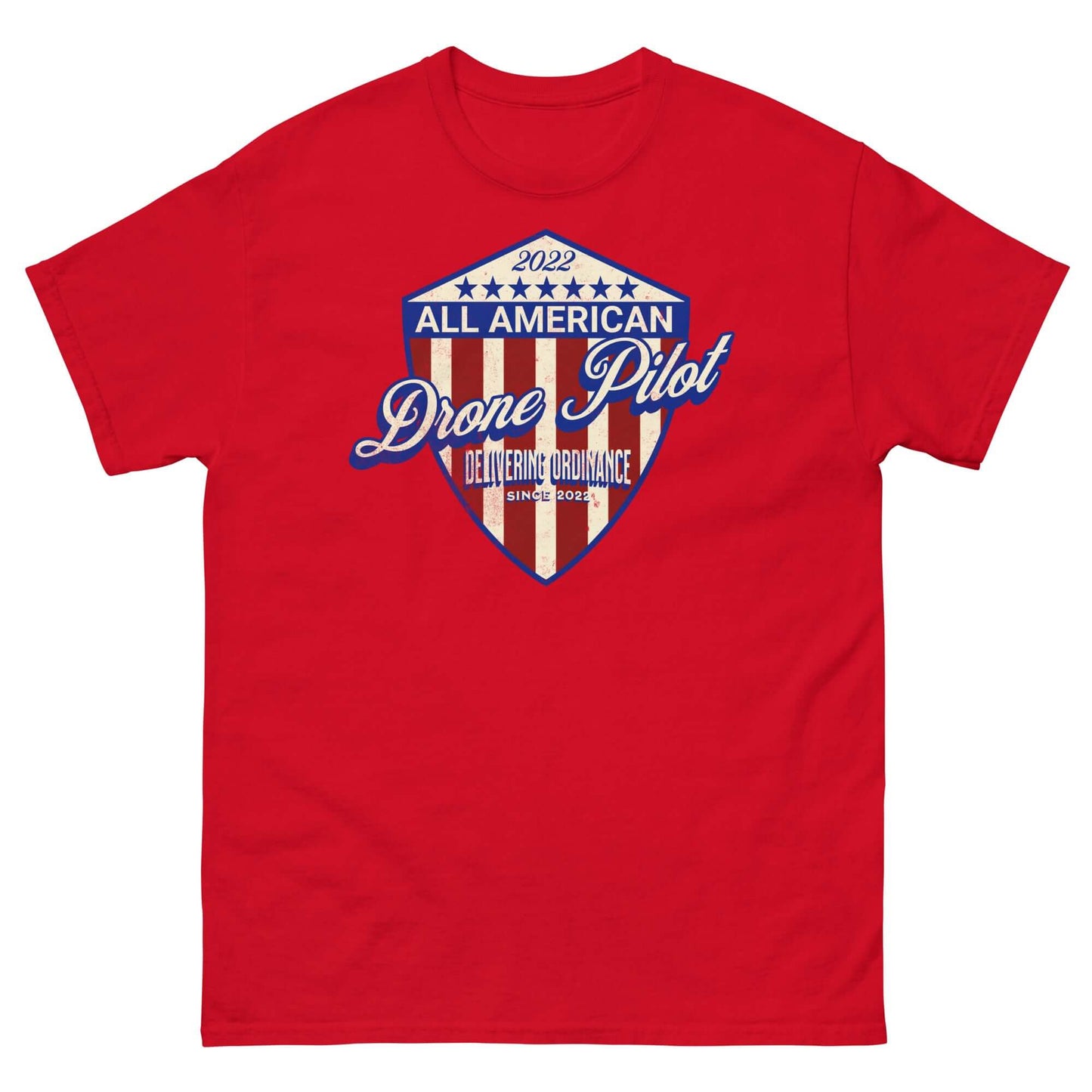 Red t-shirt featuring '2022 All American Drone Pilot' patriotic shield design for aerial performance champions.