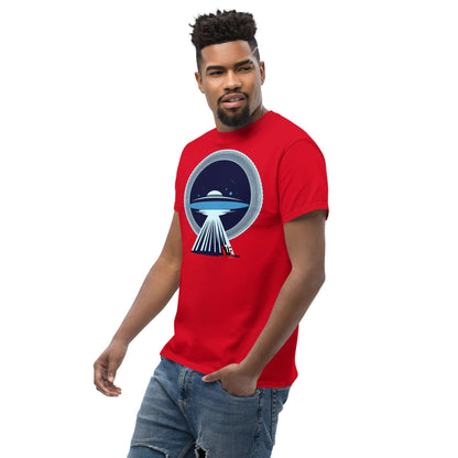 Man wearing red UFO Christmas T-shirt with UFO graphic and festive sleigh caught in beam, designed by Technium Foundry.