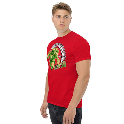 Person wearing a red UNITYUNHINGED Battle Clan T-Shirt with vibrant green astronaut design by Technium Foundry.