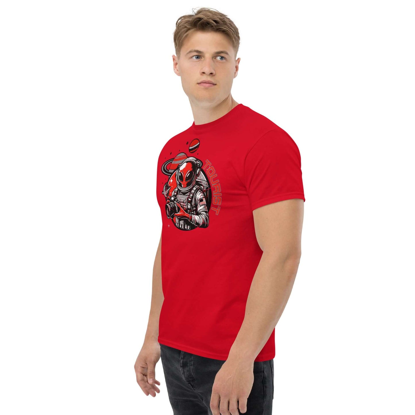 Man wearing red Space Tourist T-Shirt with alien and Saturn design, perfect for sci-fi fans and intergalactic explorers.