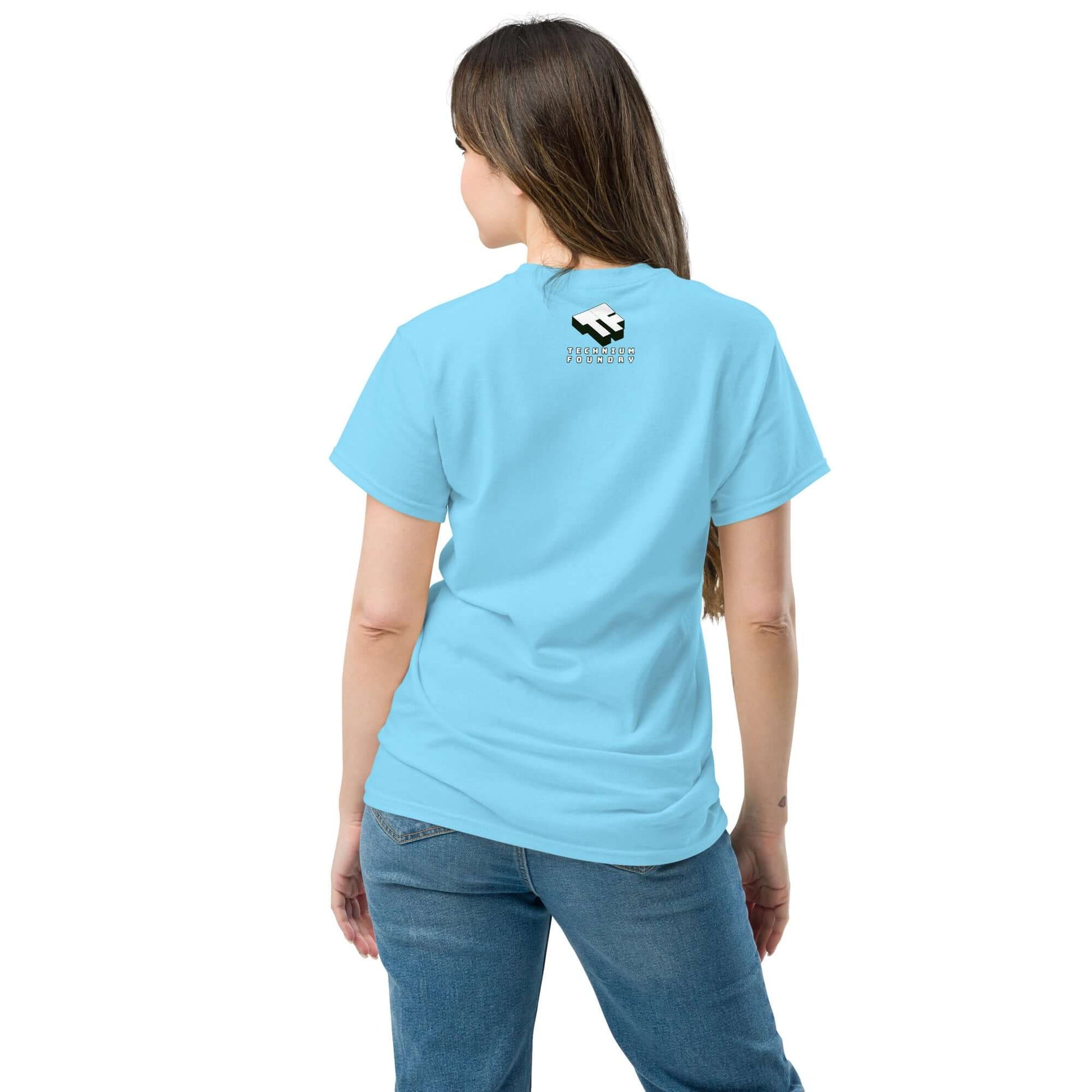 Woman wearing light blue t-shirt with logo on back, jeans, facing away.