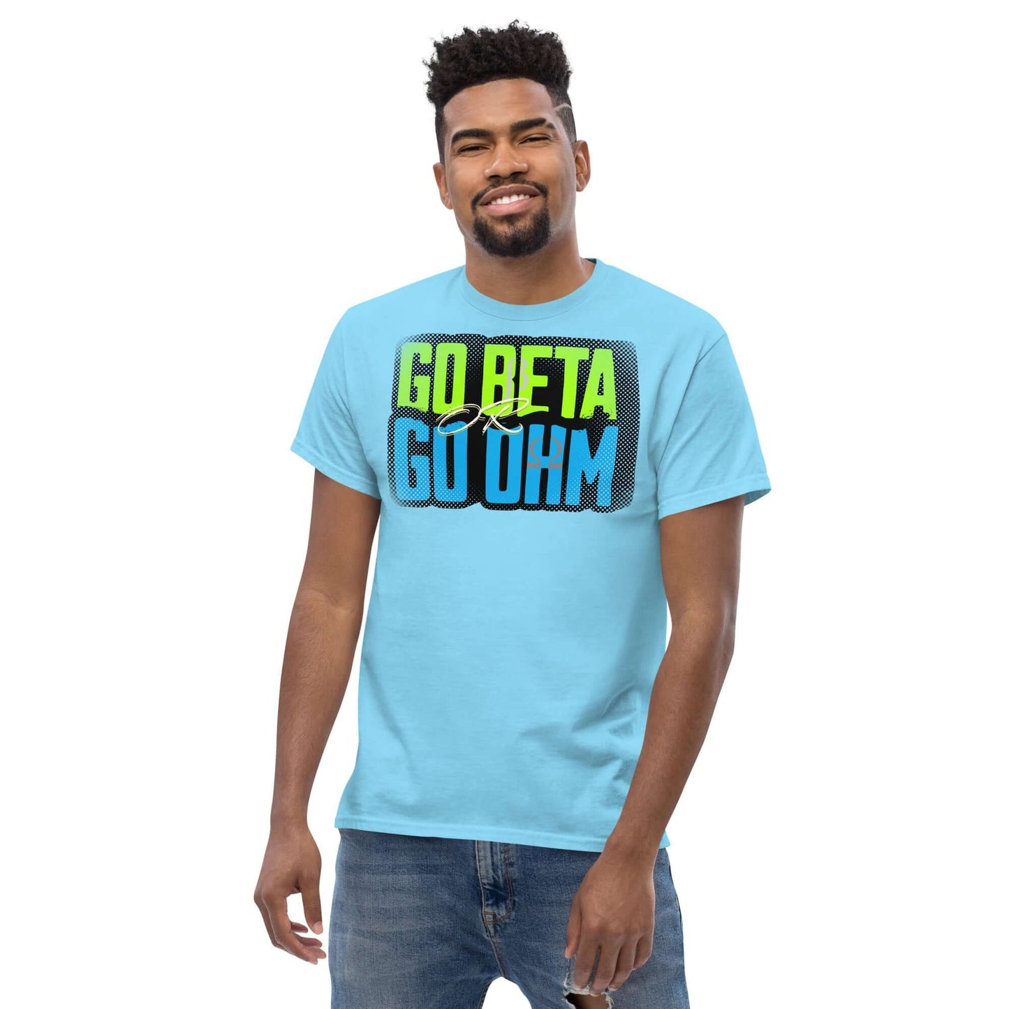 Man wearing Go Beta Go Ohm T-shirt, blending physics humor and fashion; blue shirt with bold text highlighting resistance.