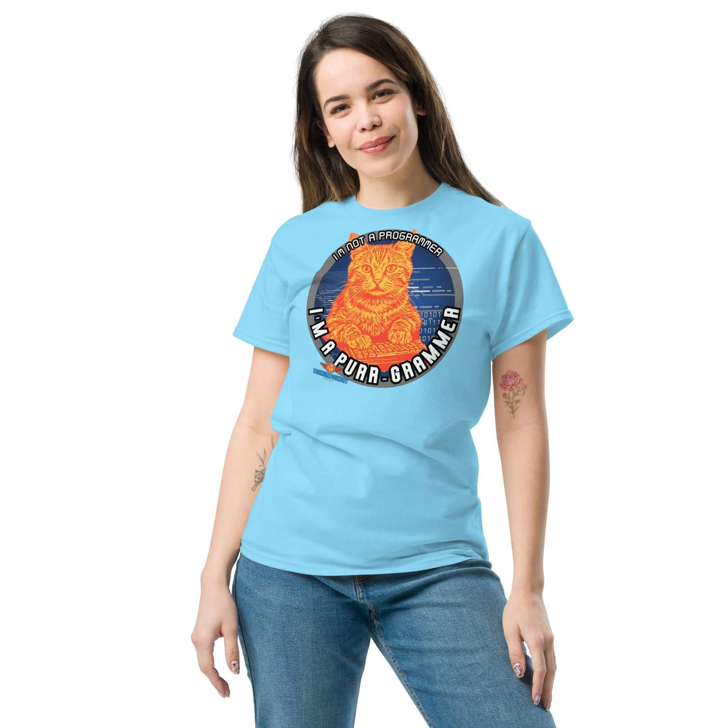 Woman wearing "The Purr-grammer's Manifesto" cat-themed tee from Science & Tech Apparel Collection by Technium Foundry.