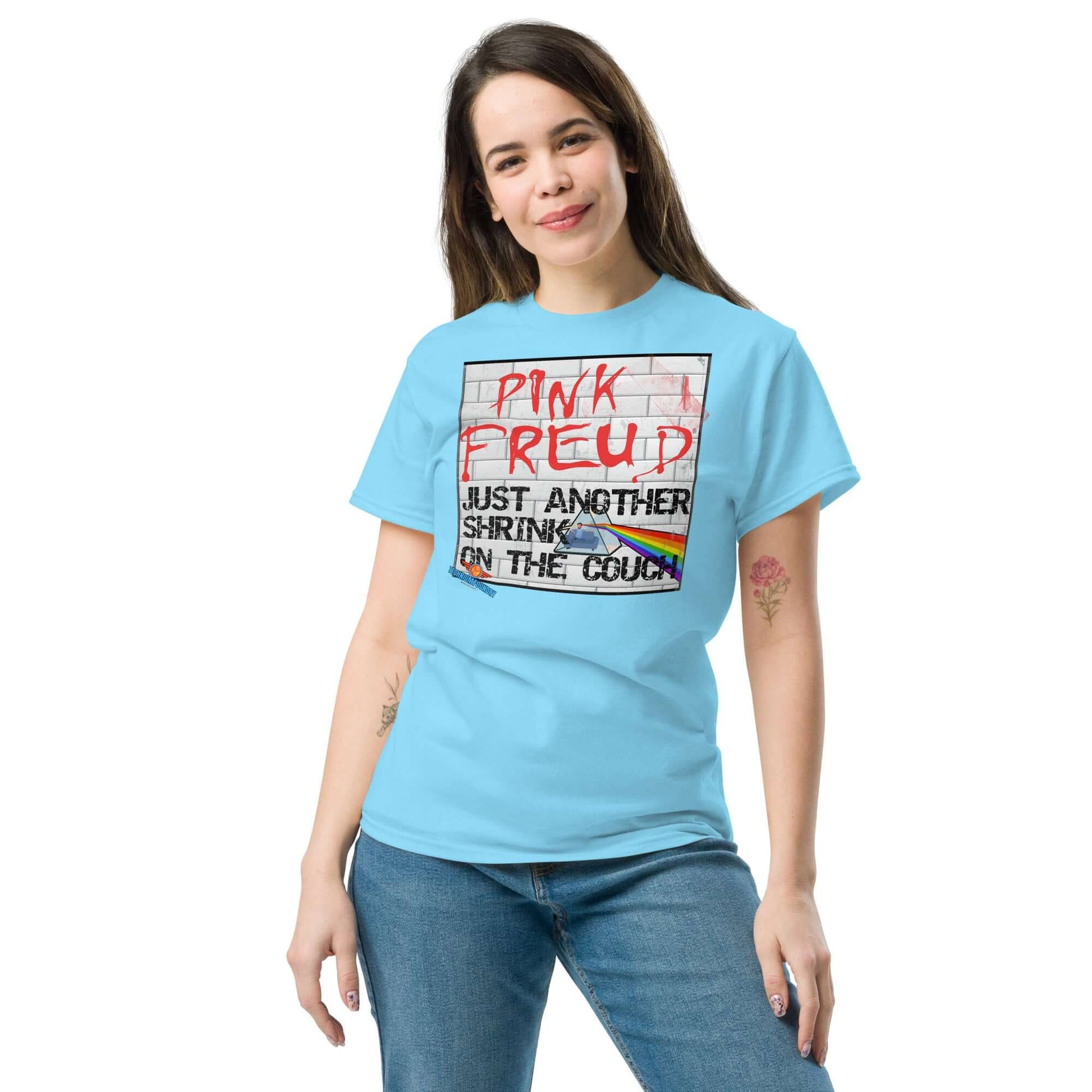 Woman wearing a "Pink Freud: Just Another Shrink on the Couch" tee, blending psychedelic rock with psychoanalysis humor from Technium Foundry.