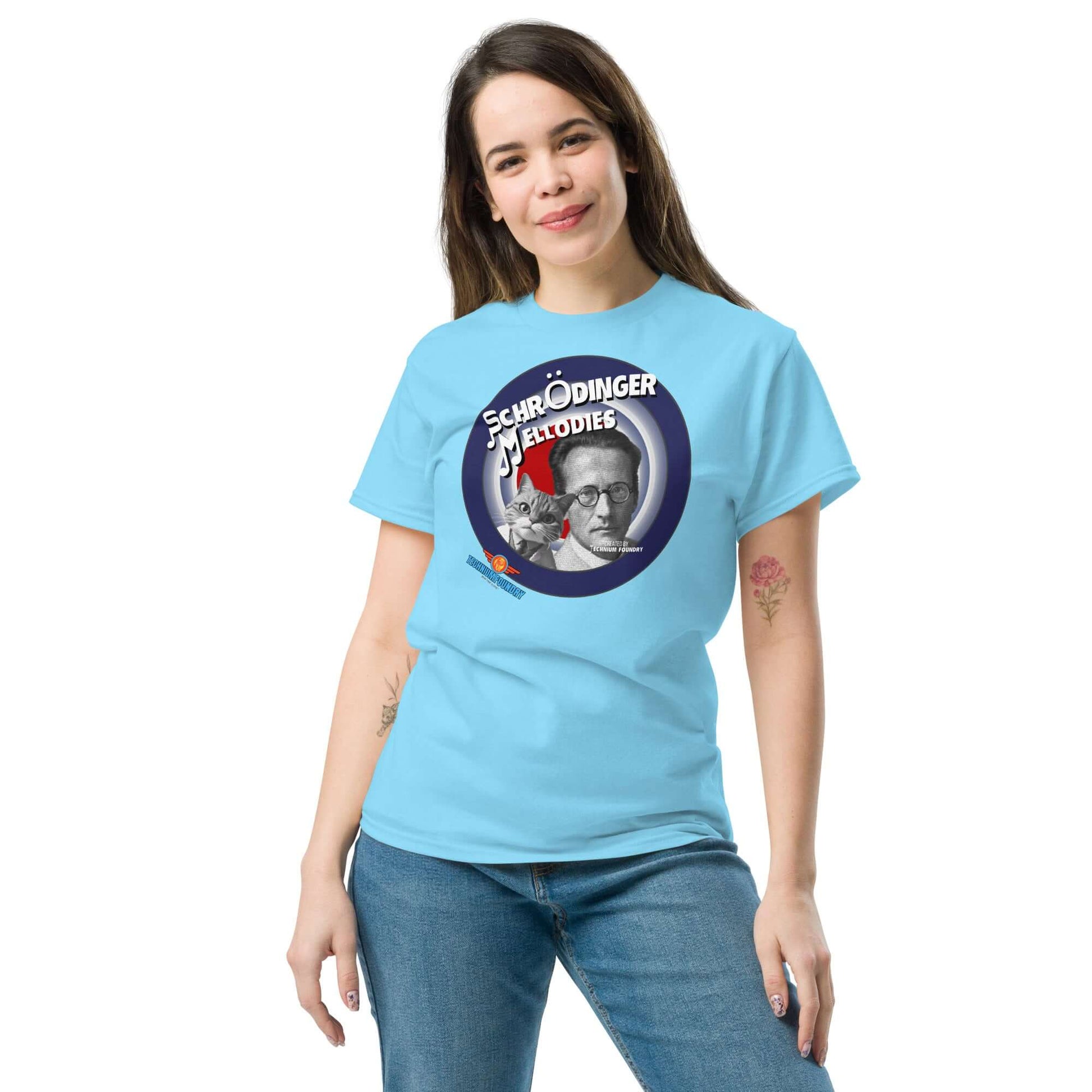 Woman wearing a "Schrödinger's Melodies" tee featuring Erwin Schrödinger design blending quantum physics and music.