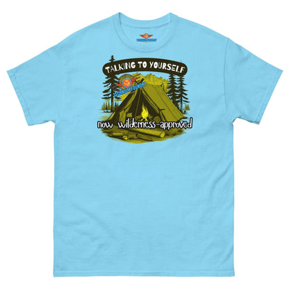 Light blue tee with camping scene and "Talking to Yourself: Now Wilderness-Approved" text, ideal for outdoor coders and campers.