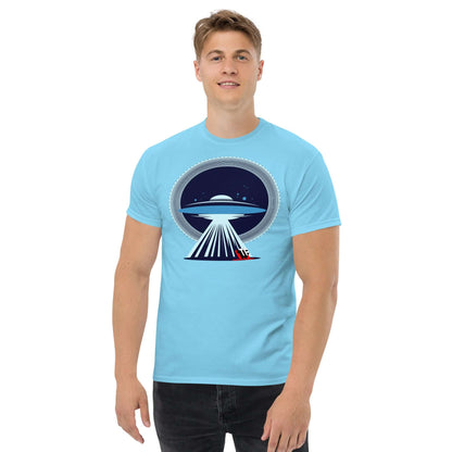 Man wearing UFO Christmas T-Shirt by Technium Foundry, featuring a UFO beaming up a red sleigh, with a festive holiday design.