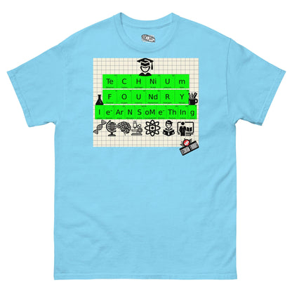 Technium Foundry Learn Something T-Shirt featuring periodic table elements and educational icons on blue fabric.