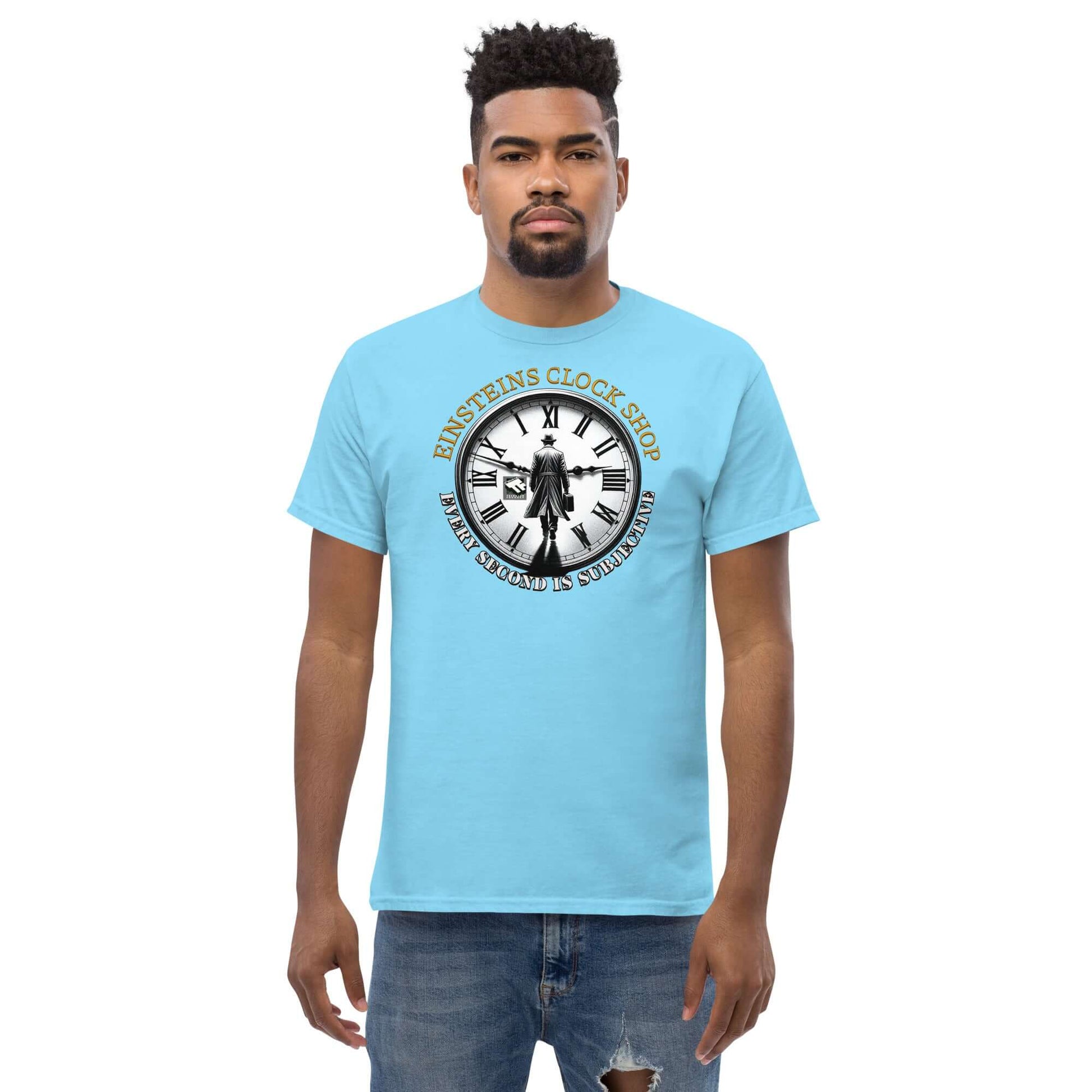 Man wearing blue Einstein's Clock Shop T-Shirt featuring a clock design symbolizing relativity and scientific humor.