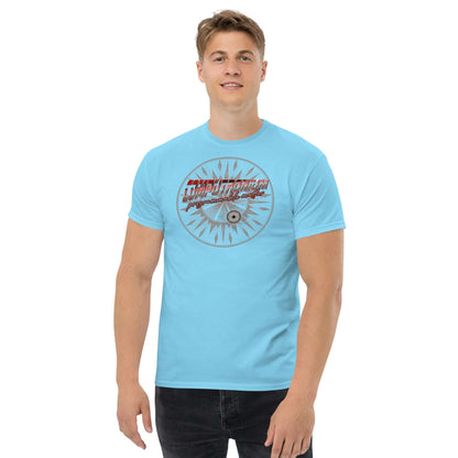 Man wearing Computronium Programmable Matter T-Shirt, light blue with starburst physics design.