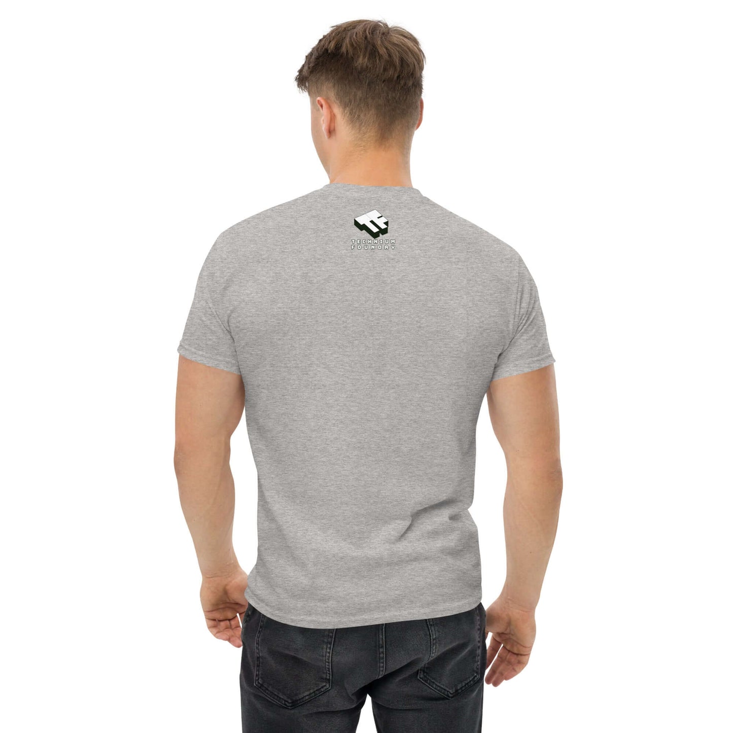 Man wearing a gray t-shirt with a small logo on the back, rear view.