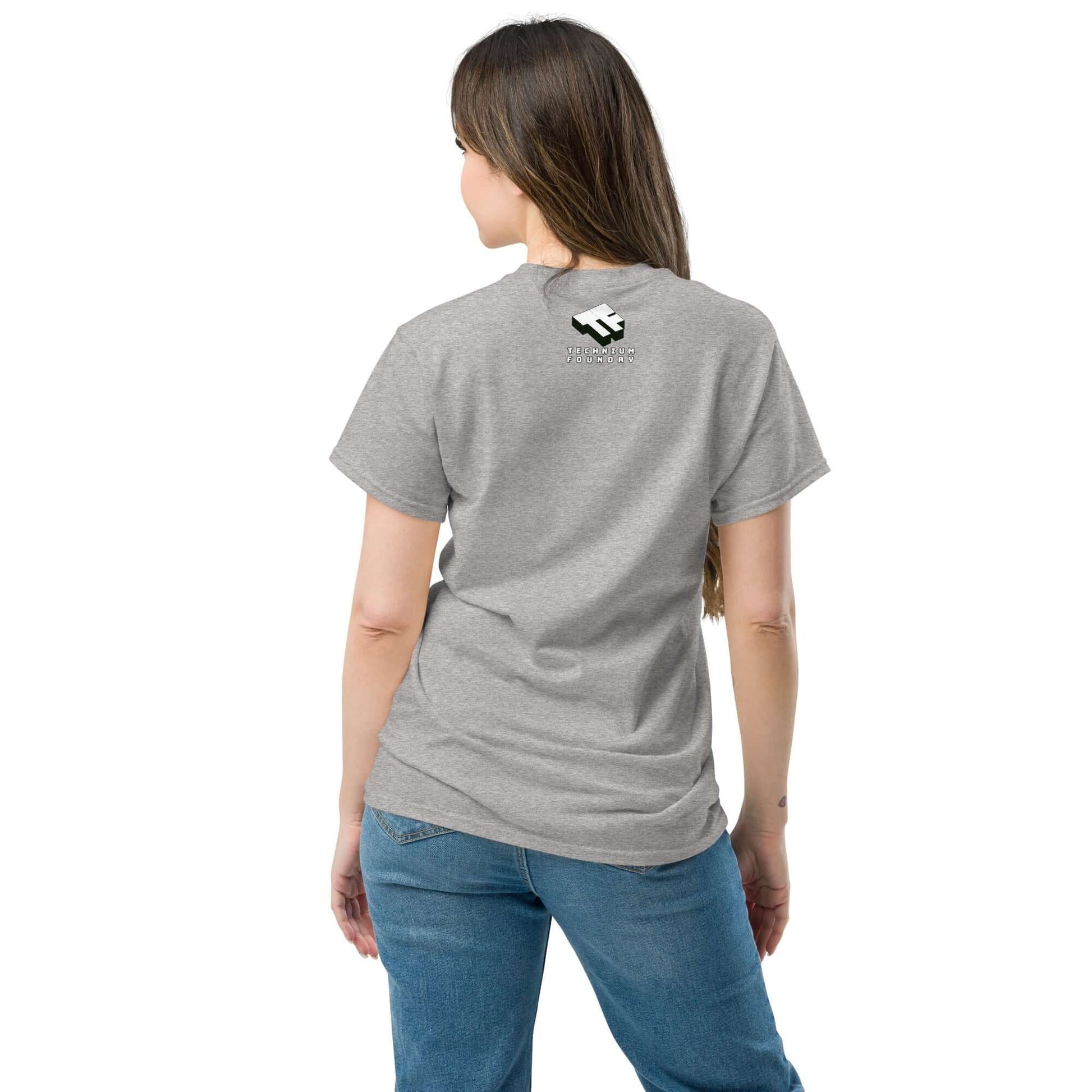 Back view of woman wearing Free California Surf T-Shirt in gray, showcasing graphic design on the back.